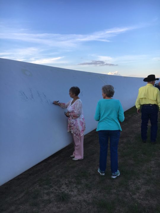 Floyd County residents at the blade signing for Cotton Plains Wind.