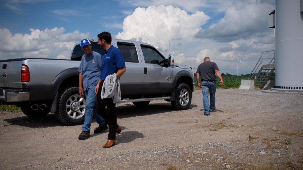 Albert Jongewaard (middle) and Isabella Wind landowner George Green tour a wind farm.