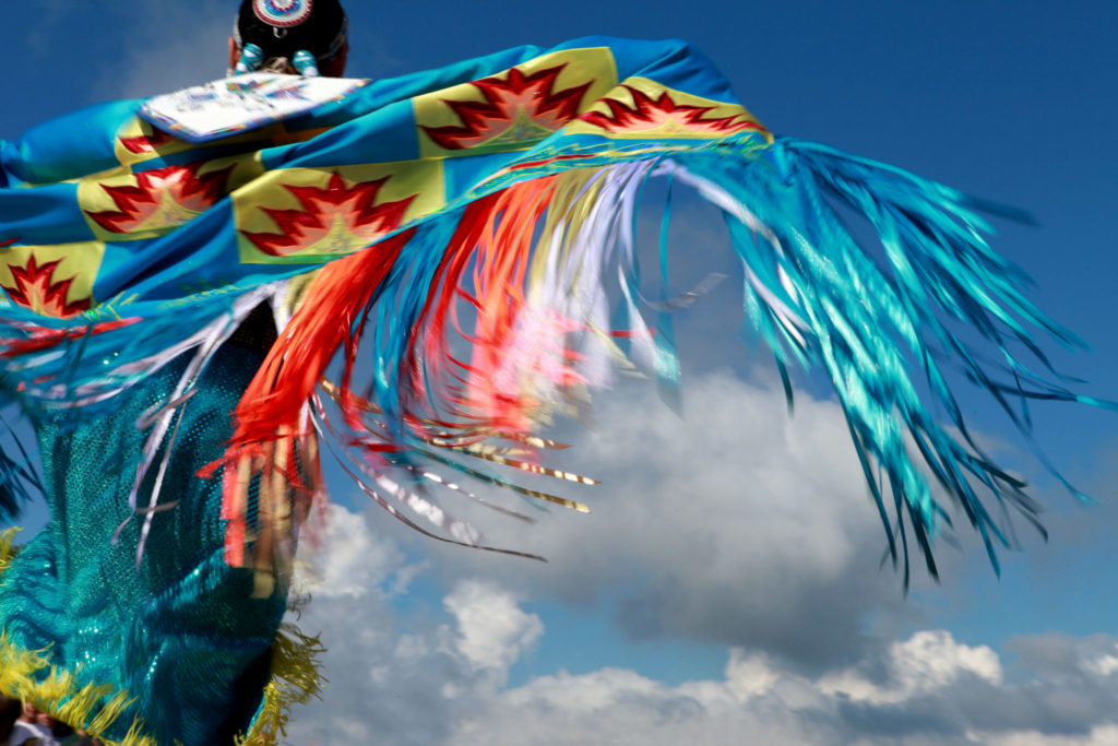 A Lakota Indian dancing.
