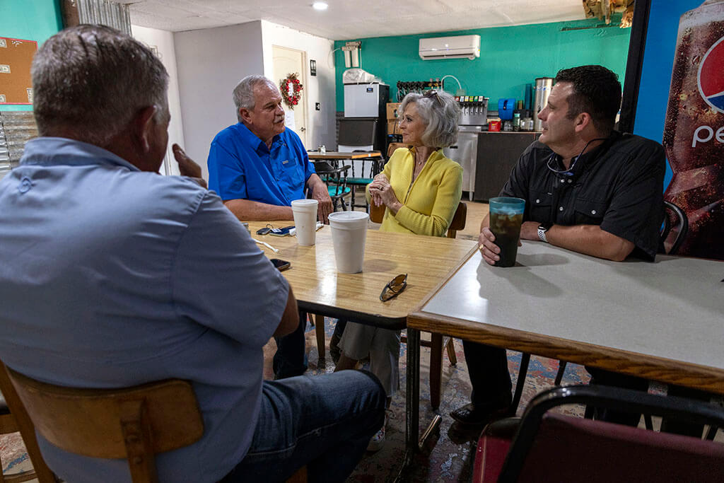 people sit around a table