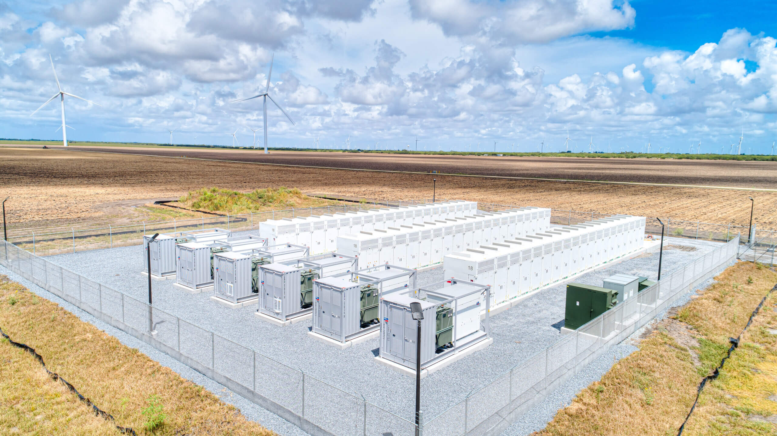 wind turbines and battery storage in Texas landscape